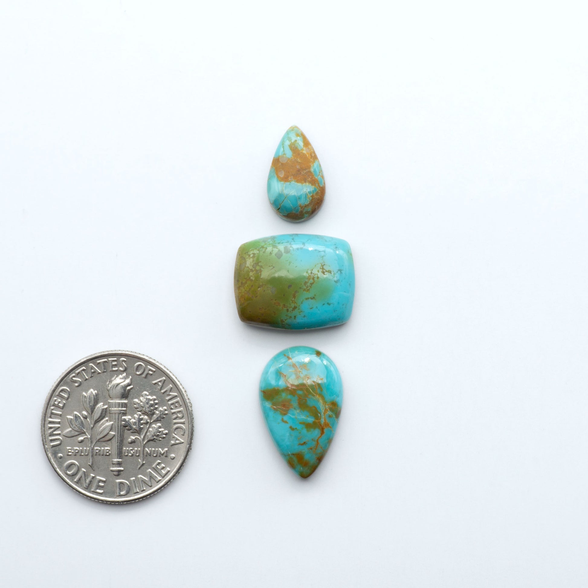 Add a touch of beauty to your collection with our stunning Pilot Mountain Turquoise Cabochons. Perfect for jewelry making each piece is truly one-of-a-kind.