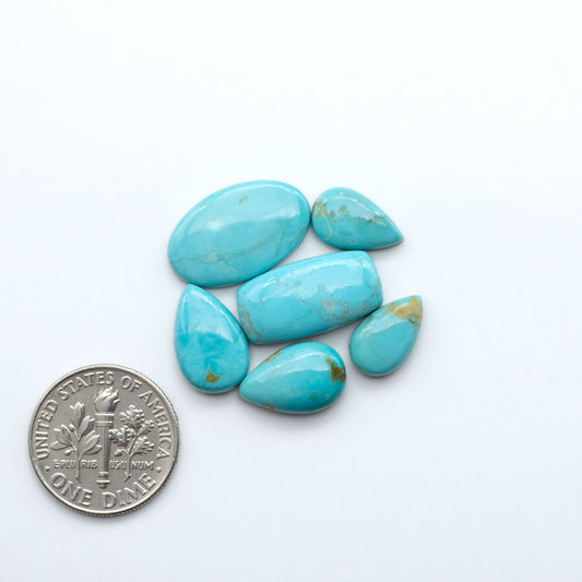 Add a touch of beauty to your collection with our stunning Pilot Mountain Turquoise Cabochons. Perfect for jewelry making each piece is truly one-of-a-kind.