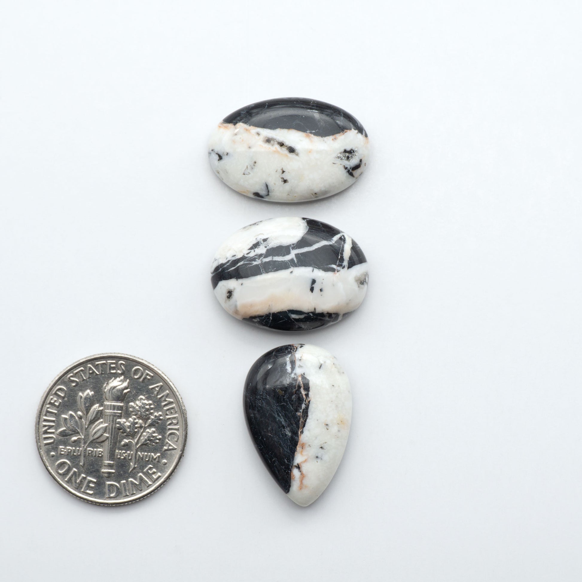 Natural White Buffalo Stone Cabochons are semi-precious gemstones cut into shapes ideal for jewelry-making, making them an excellent choice for artisans.