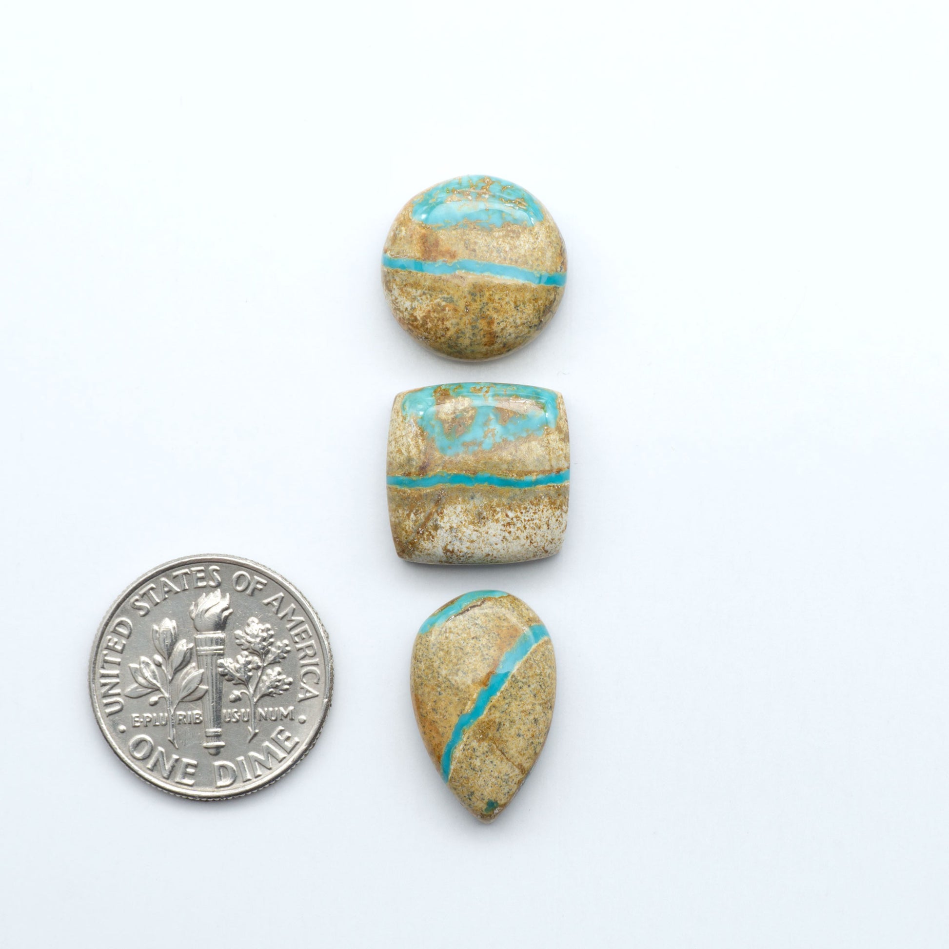 Royston Turquoise cabochons are famous for their distinctive matrix and unique green and blue hues, making them a favored option among jewelry designers.