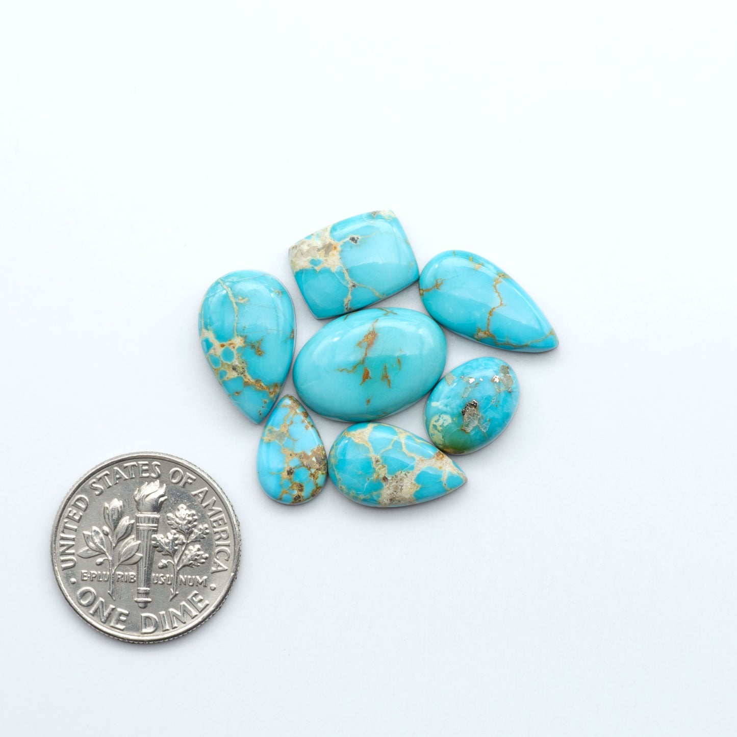 Sierra Bella Turquoise cabochons feature rich blue-green color and natural matrix variation. Ideal for silversmiths, jewelers, and custom jewelry designs