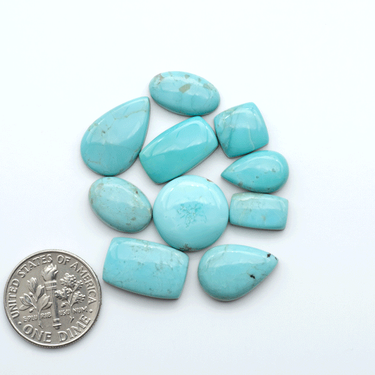Add a touch of beauty to your collection with our stunning Pilot Mountain Turquoise Cabochons. Perfect for jewelry making each piece is truly one-of-a-kind.
