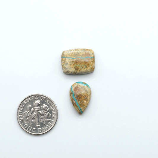 Royston Turquoise cabochons are famous for their distinctive matrix and unique green and blue hues, making them a favored option among jewelry designers.