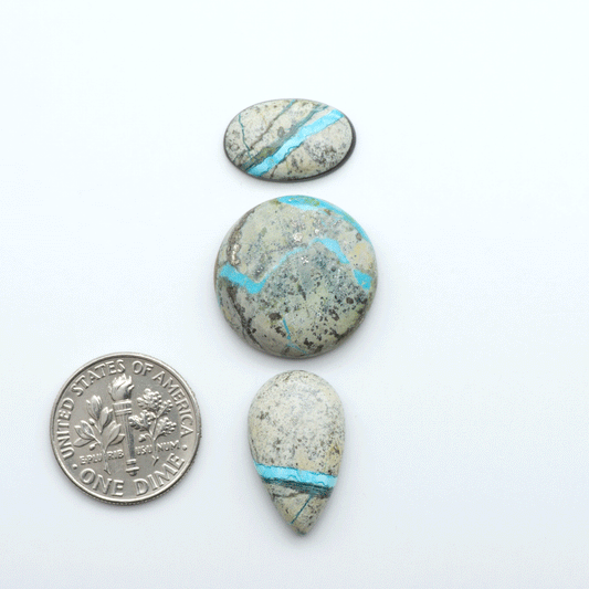 Royston Turquoise cabochons are famous for their distinctive matrix and unique green and blue hues, making them a favored option among jewelry designers.