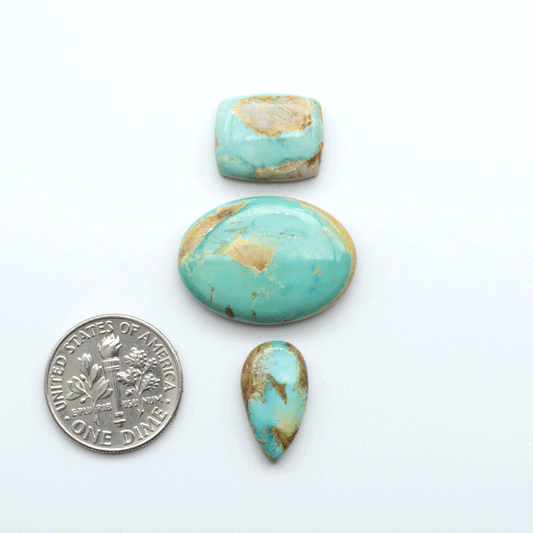 Royston Turquoise cabochons are famous for their distinctive matrix and unique green and blue hues, making them a favored option among jewelry designers.
