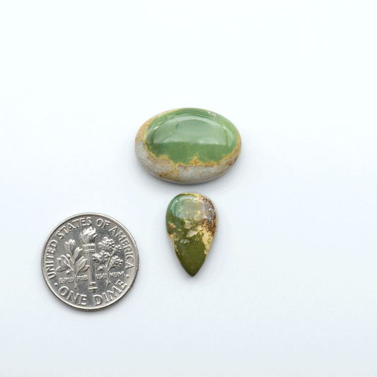 Royston Turquoise cabochons are famous for their distinctive matrix and unique green and blue hues, making them a favored option among jewelry designers.