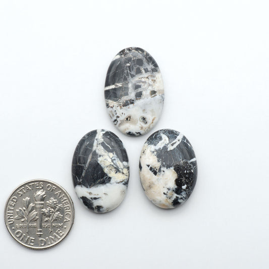 Natural White Buffalo Stone Cabochons are semi-precious gemstones cut into shapes ideal for jewelry-making, making them an excellent choice for artisans.
