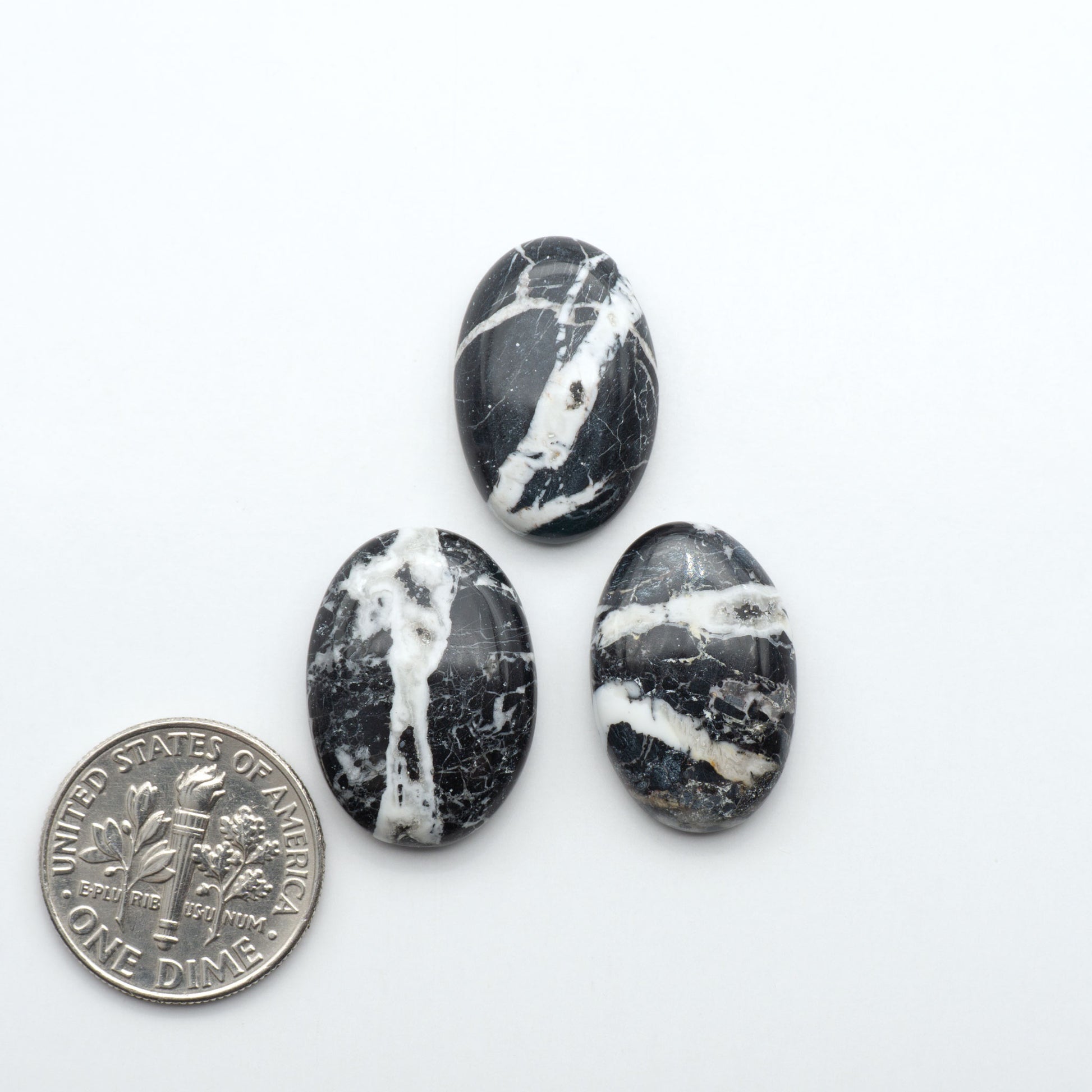 Natural White Buffalo Stone Cabochons are semi-precious gemstones cut into shapes ideal for jewelry-making, making them an excellent choice for artisans.
