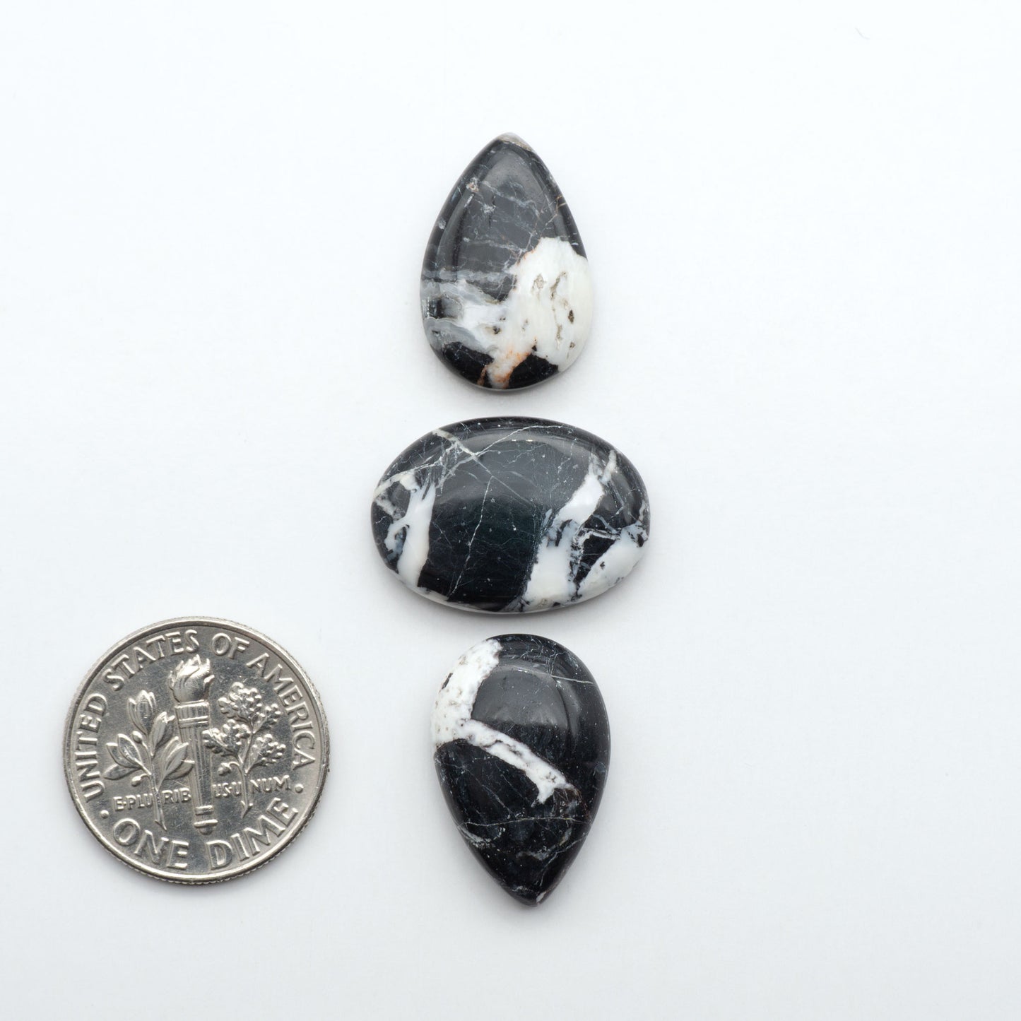 Natural White Buffalo Stone Cabochons are semi-precious gemstones cut into shapes ideal for jewelry-making, making them an excellent choice for artisans.
