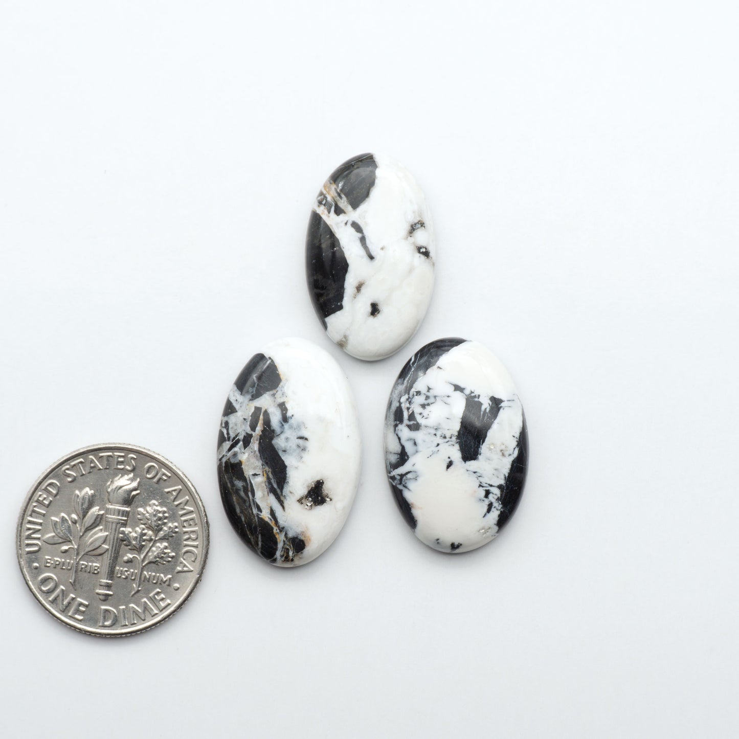 Natural White Buffalo Stone Cabochons are semi-precious gemstones cut into shapes ideal for jewelry-making, making them an excellent choice for artisans.
