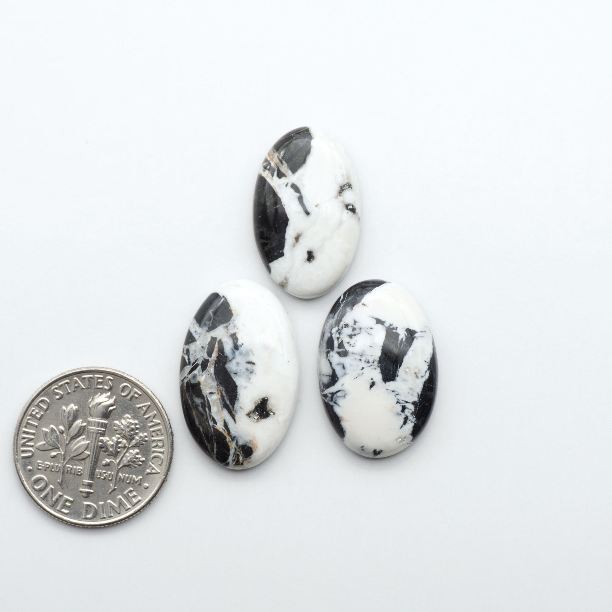 Natural White Buffalo Stone Cabochons are semi-precious gemstones cut into shapes ideal for jewelry-making, making them an excellent choice for artisans.
