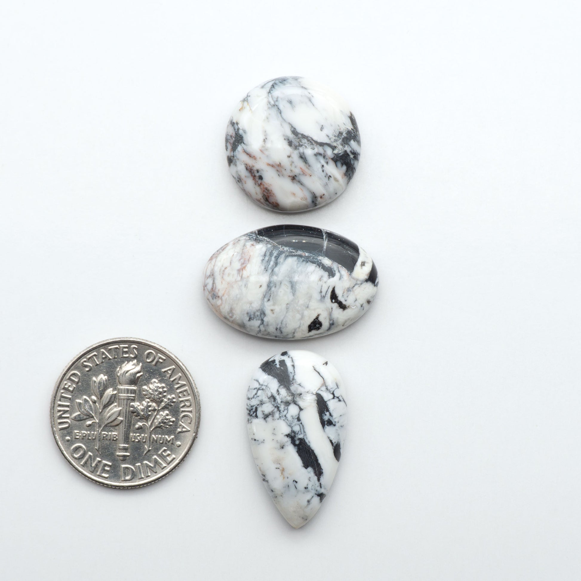 Natural White Buffalo Stone Cabochons are semi-precious gemstones cut into shapes ideal for jewelry-making, making them an excellent choice for artisans.
