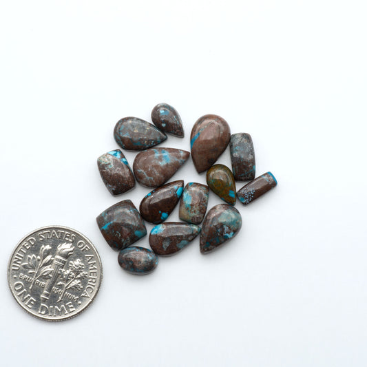 Rare Bisbee Turquoise cabochons with rich blue color and classic brown matrix. Perfect for jewelry makers, collectors, and lovers of fine American turquoise.
