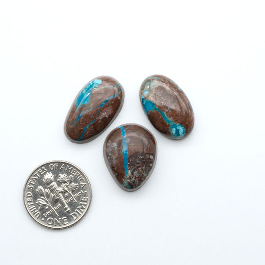 Rare Bisbee Turquoise cabochons with rich blue color and classic brown matrix. Perfect for jewelry makers, collectors, and lovers of fine American turquoise.
