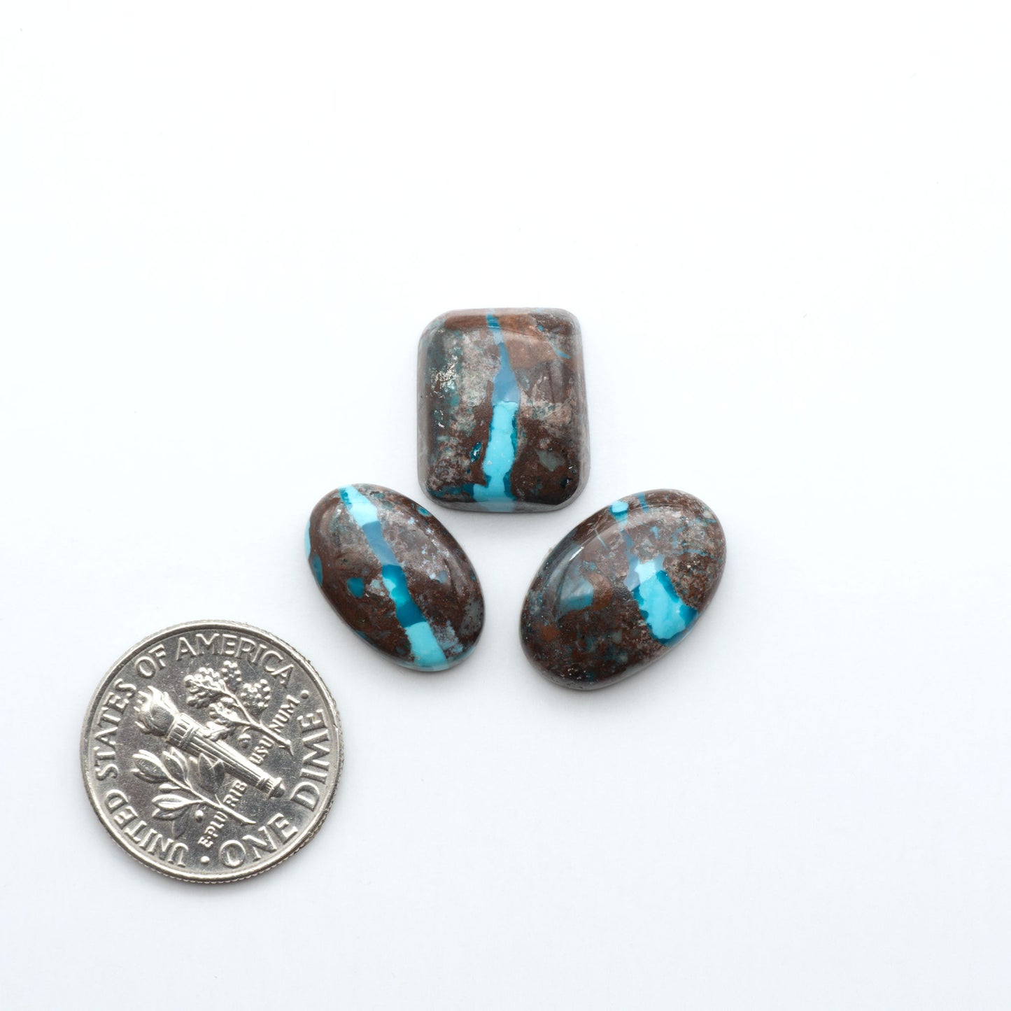 Rare Bisbee Turquoise cabochons with rich blue color and classic brown matrix. Perfect for jewelry makers, collectors, and lovers of fine American turquoise.
