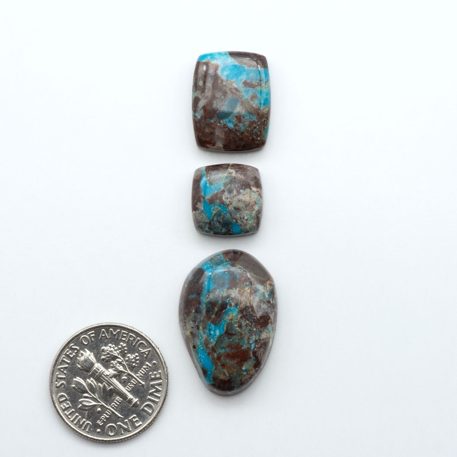 Rare Bisbee Turquoise cabochons with rich blue color and classic brown matrix. Perfect for jewelry makers, collectors, and lovers of fine American turquoise.
