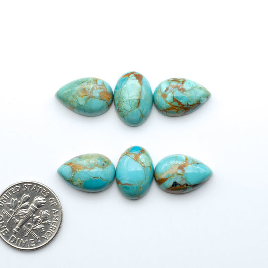 Enhance your jewelry designs with Pressed Turquoise Nugget Cabochons. Crafted from composite materials they add a captivating touch to your creations.
