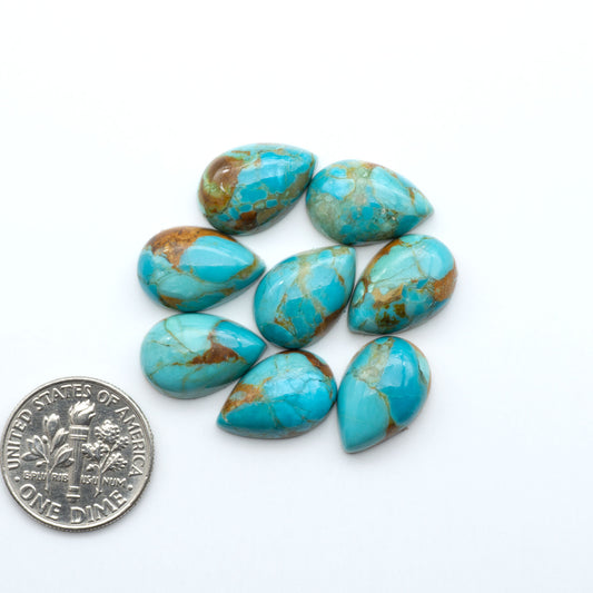 Enhance your jewelry designs with Pressed Turquoise Nugget Cabochons. Crafted from composite materials they add a captivating touch to your creations.
