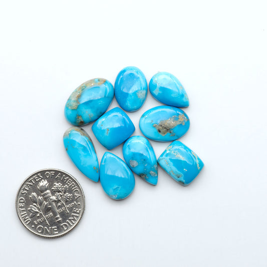 Kingman Turquoise Cabochons are a staple in the jewelry industry, known for their stunning blue-green color. Perfect for necklaces, earrings, and more!