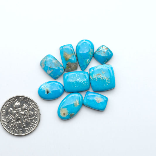 Kingman Turquoise Cabochons are a staple in the jewelry industry, known for their stunning blue-green color. Perfect for necklaces, earrings, and more!