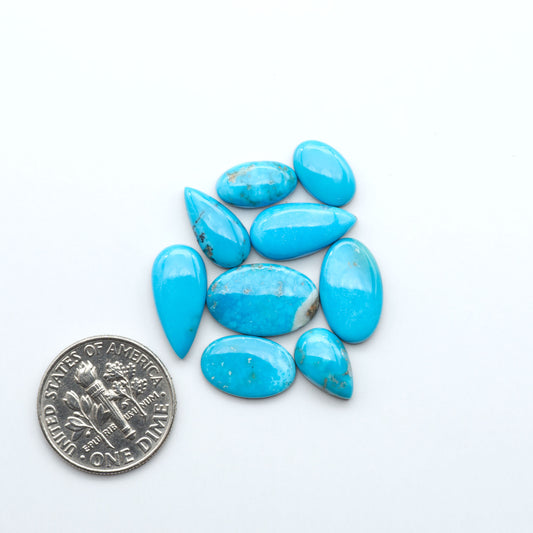 Kingman Turquoise Cabochons are a staple in the jewelry industry, known for their stunning blue-green color. Perfect for necklaces, earrings, and more!
