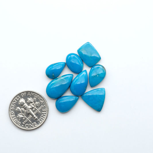 Kingman Turquoise Cabochons are a staple in the jewelry industry, known for their stunning blue-green color. Perfect for necklaces, earrings, and more!