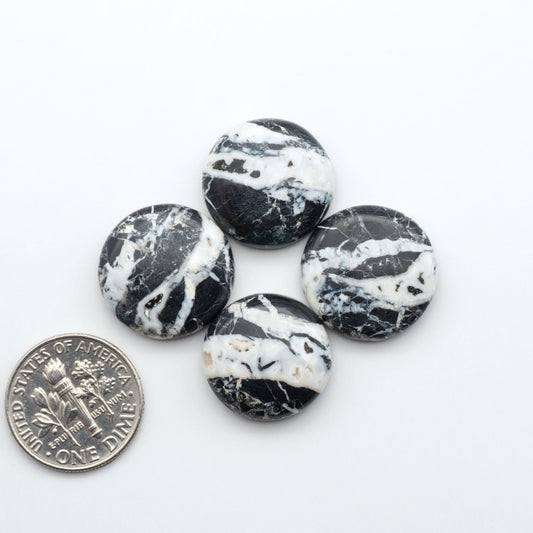 Natural White Buffalo Stone Cabochons are semi-precious gemstones cut into shapes ideal for jewelry-making, making them an excellent choice for artisans.