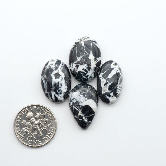 Natural White Buffalo Stone Cabochons are semi-precious gemstones cut into shapes ideal for jewelry-making, making them an excellent choice for artisans.