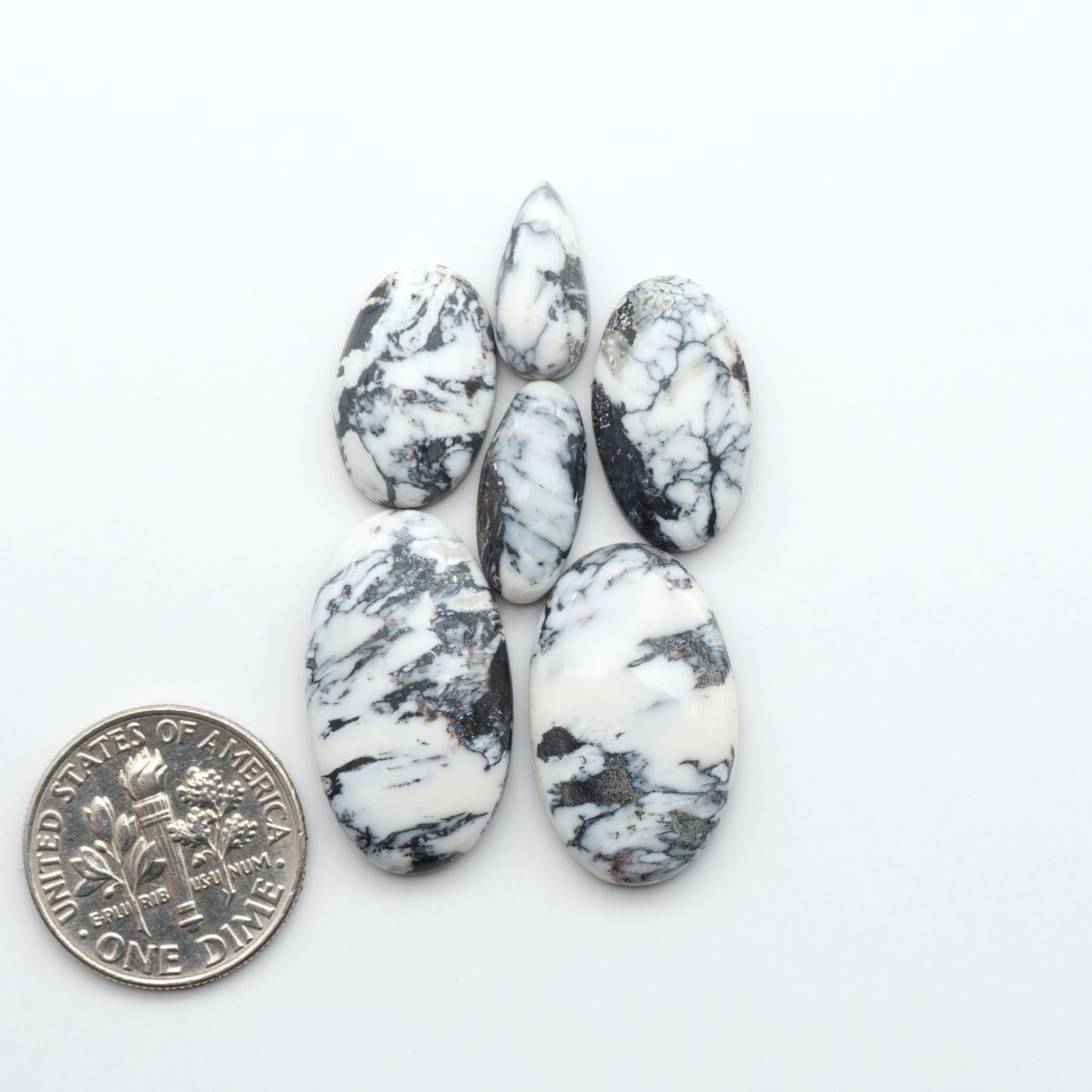 Natural White Buffalo Stone Cabochons are semi-precious gemstones cut into shapes ideal for jewelry-making, crafting and are