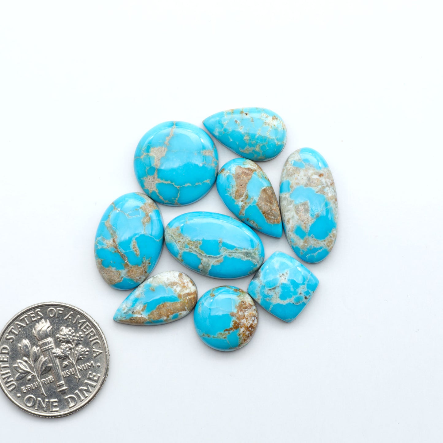 Sierra Bella Turquoise cabochons feature rich blue-green color and natural matrix variation. Ideal for silversmiths, jewelers, and custom jewelry designs