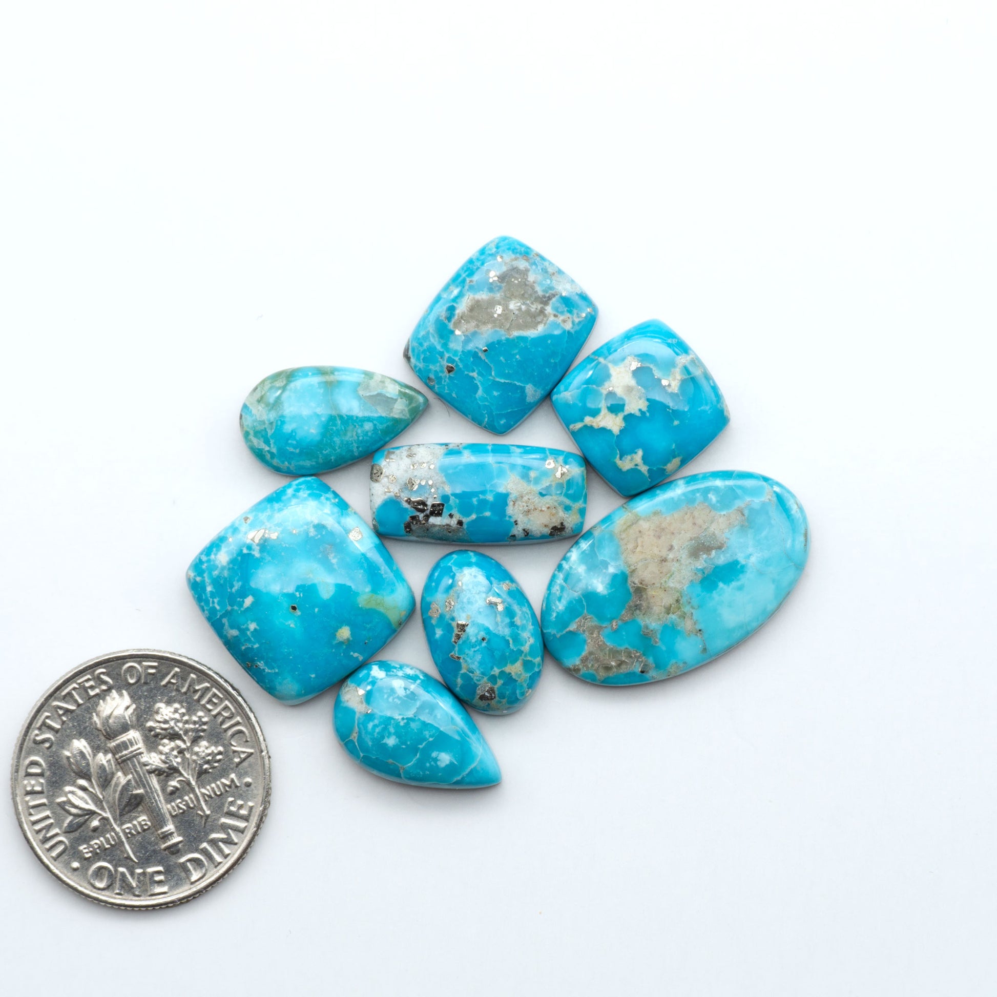 Sierra Bella Turquoise cabochons feature rich blue-green color and natural matrix variation. Ideal for silversmiths, jewelers, and custom jewelry designs