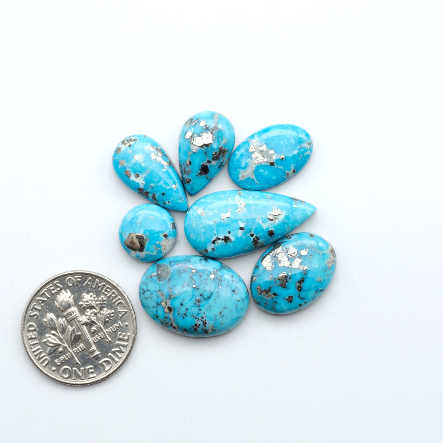 Sierra Bella Turquoise cabochons feature rich blue-green color and natural matrix variation. Ideal for silversmiths, jewelers, and custom jewelry designs