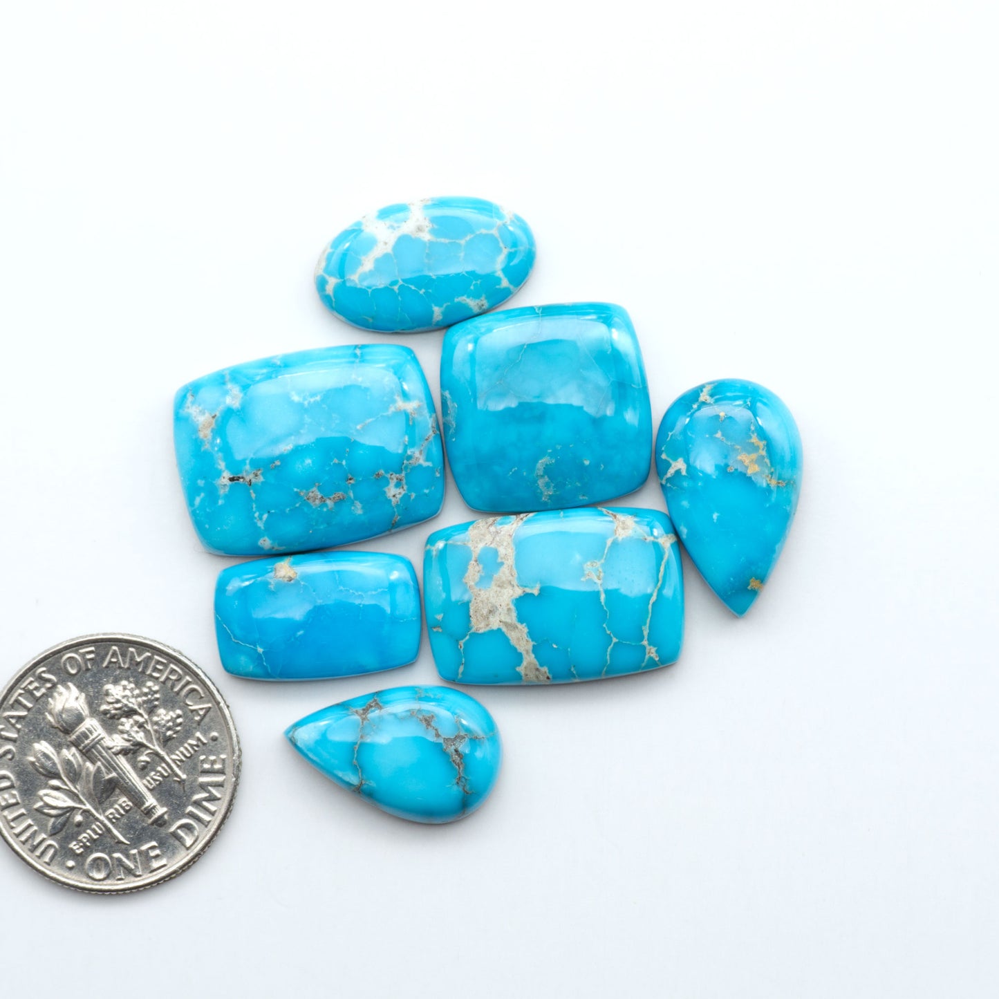 Sierra Bella Turquoise cabochons feature rich blue-green color and natural matrix variation. Ideal for silversmiths, jewelers, and custom jewelry designs