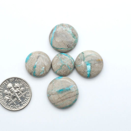Carico Lake Turquoise cabochons with vibrant aqua-blue to turquoise tones and natural matrix, ideal for rings, pendants, and artisan jewelry.