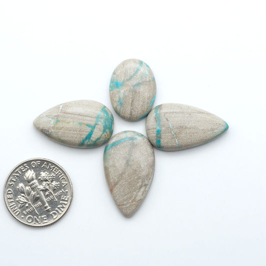 Carico Lake Turquoise cabochons with vibrant aqua-blue to turquoise tones and natural matrix, ideal for rings, pendants, and artisan jewelry.