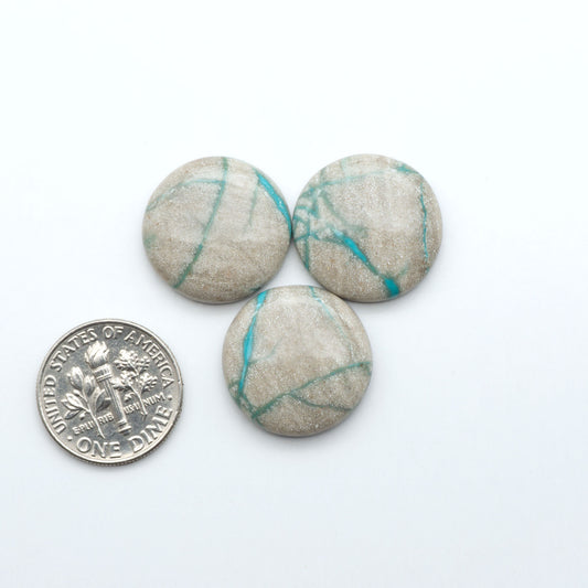 Carico Lake Turquoise cabochons with vibrant aqua-blue to turquoise tones and natural matrix, ideal for rings, pendants, and artisan jewelry.
