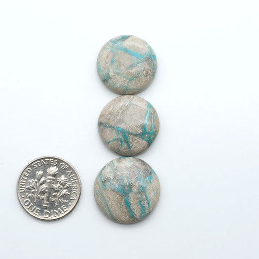 Carico Lake Turquoise cabochons with vibrant aqua-blue to turquoise tones and natural matrix, ideal for rings, pendants, and artisan jewelry.