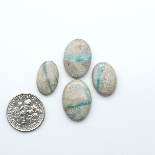 Carico Lake Turquoise cabochons with vibrant aqua-blue to turquoise tones and natural matrix, ideal for rings, pendants, and artisan jewelry.
