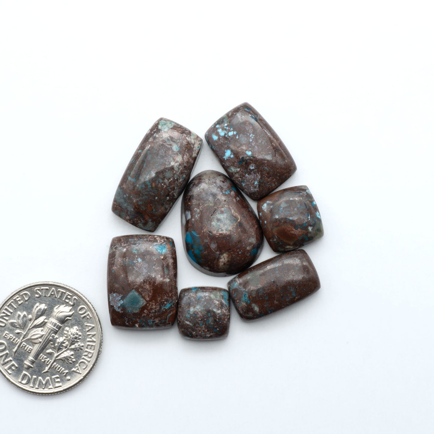 Rare Bisbee Turquoise cabochons with rich blue color and classic brown matrix. Perfect for jewelry makers, collectors, and lovers of fine American turquoise.
