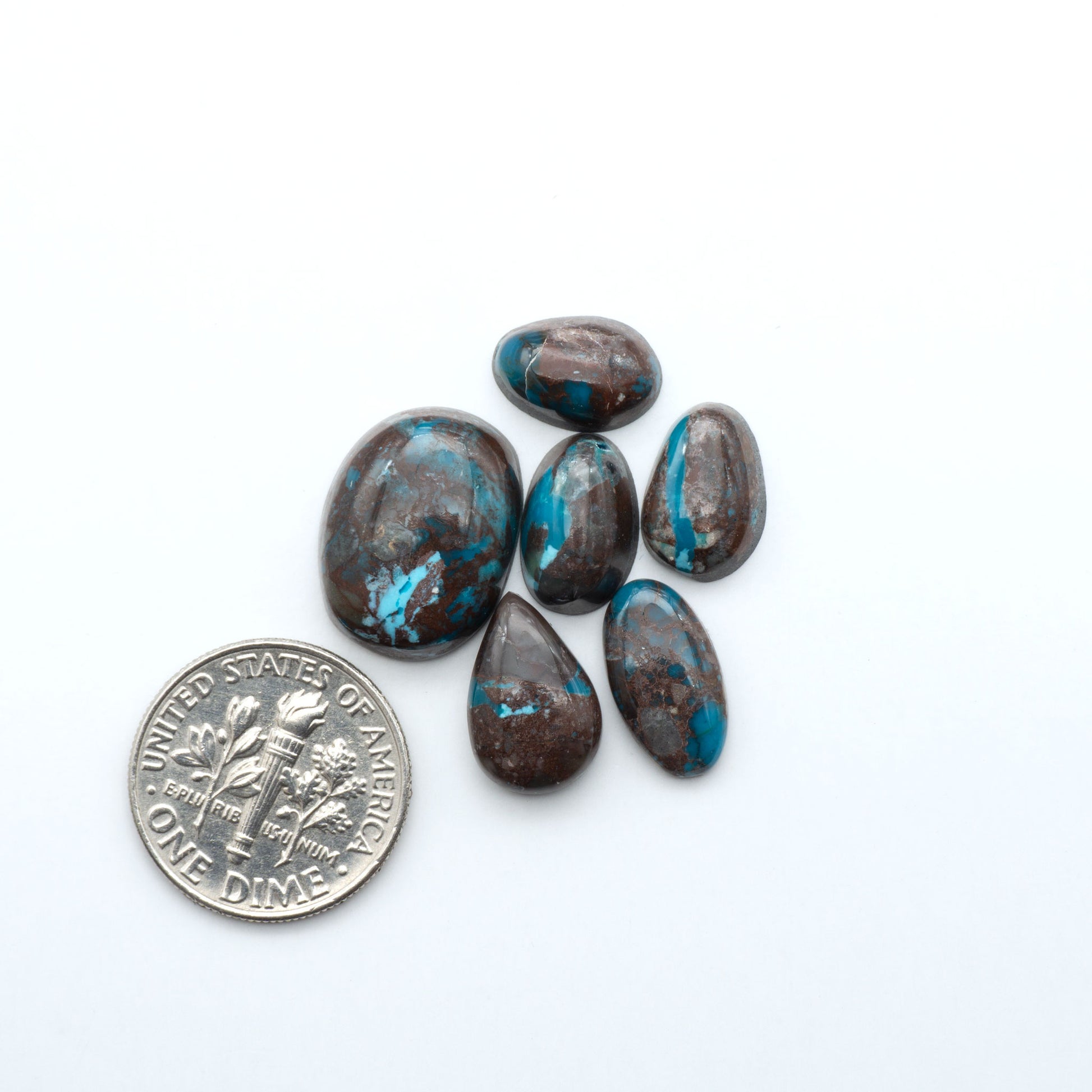 Rare Bisbee Turquoise cabochons with rich blue color and classic brown matrix. Perfect for jewelry makers, collectors, and lovers of fine American turquoise.