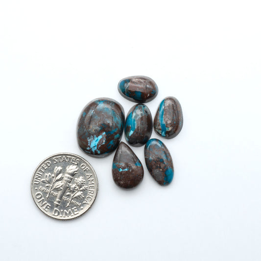 Rare Bisbee Turquoise cabochons with rich blue color and classic brown matrix. Perfect for jewelry makers, collectors, and lovers of fine American turquoise.