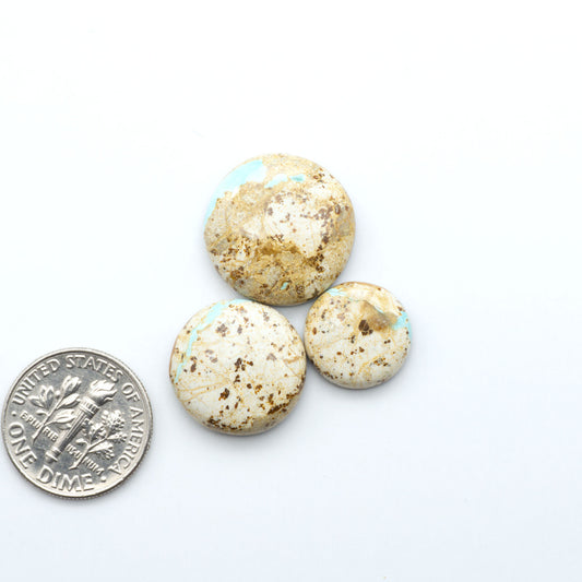 Royston Turquoise cabochons are famous for their distinctive matrix and unique green and blue hues, making them a favored option among jewelry designers.