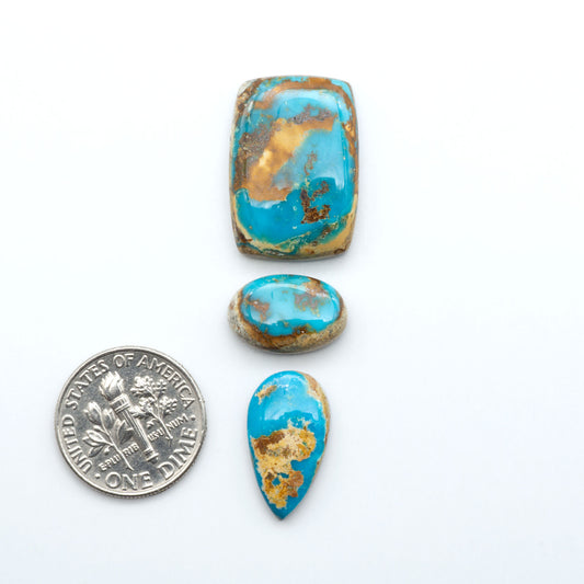 Royston Turquoise cabochons are famous for their distinctive matrix and unique green and blue hues, making them a favored option among jewelry designers.