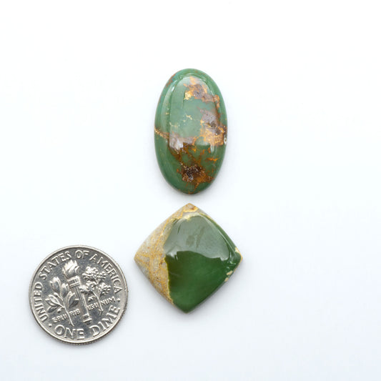 Royston Turquoise cabochons are famous for their distinctive matrix and unique green and blue hues, making them a favored option among jewelry designers.