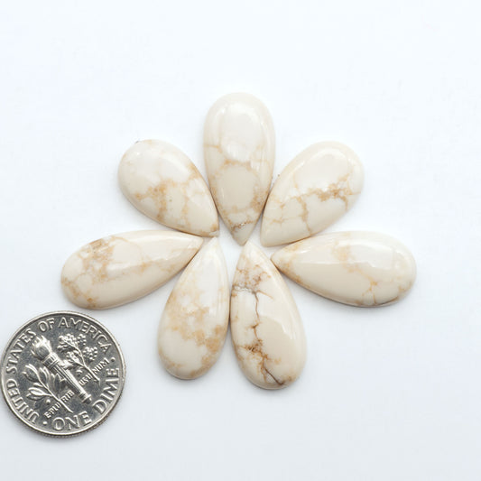 Magnesite Cabochons are a must-have for jewelry makers. These stones feature a unique blend of white and brown making them perfect for a variety of designs.