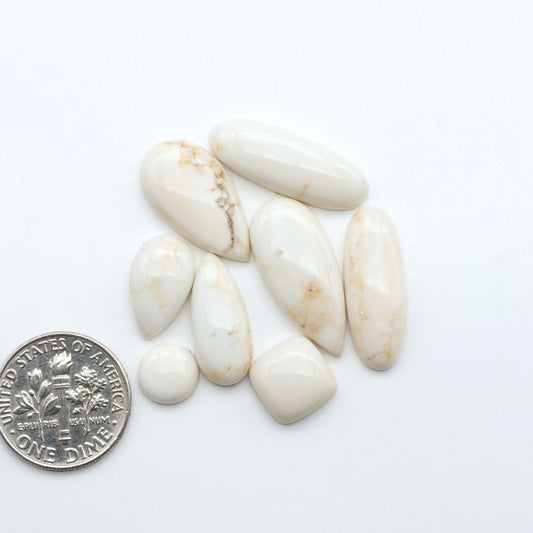 Magnesite Cabochons are a must-have for jewelry makers. These stones feature a unique blend of white and brown making them perfect for a variety of designs.