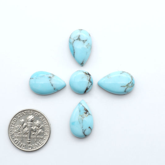 Enhance your jewelry designs with Pressed Turquoise Nugget Cabochons. Crafted from composite materials they add a captivating touch to your creations.