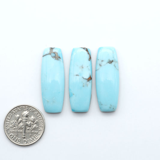Enhance your jewelry designs with Pressed Turquoise Nugget Cabochons. Crafted from composite materials they add a captivating touch to your creations.