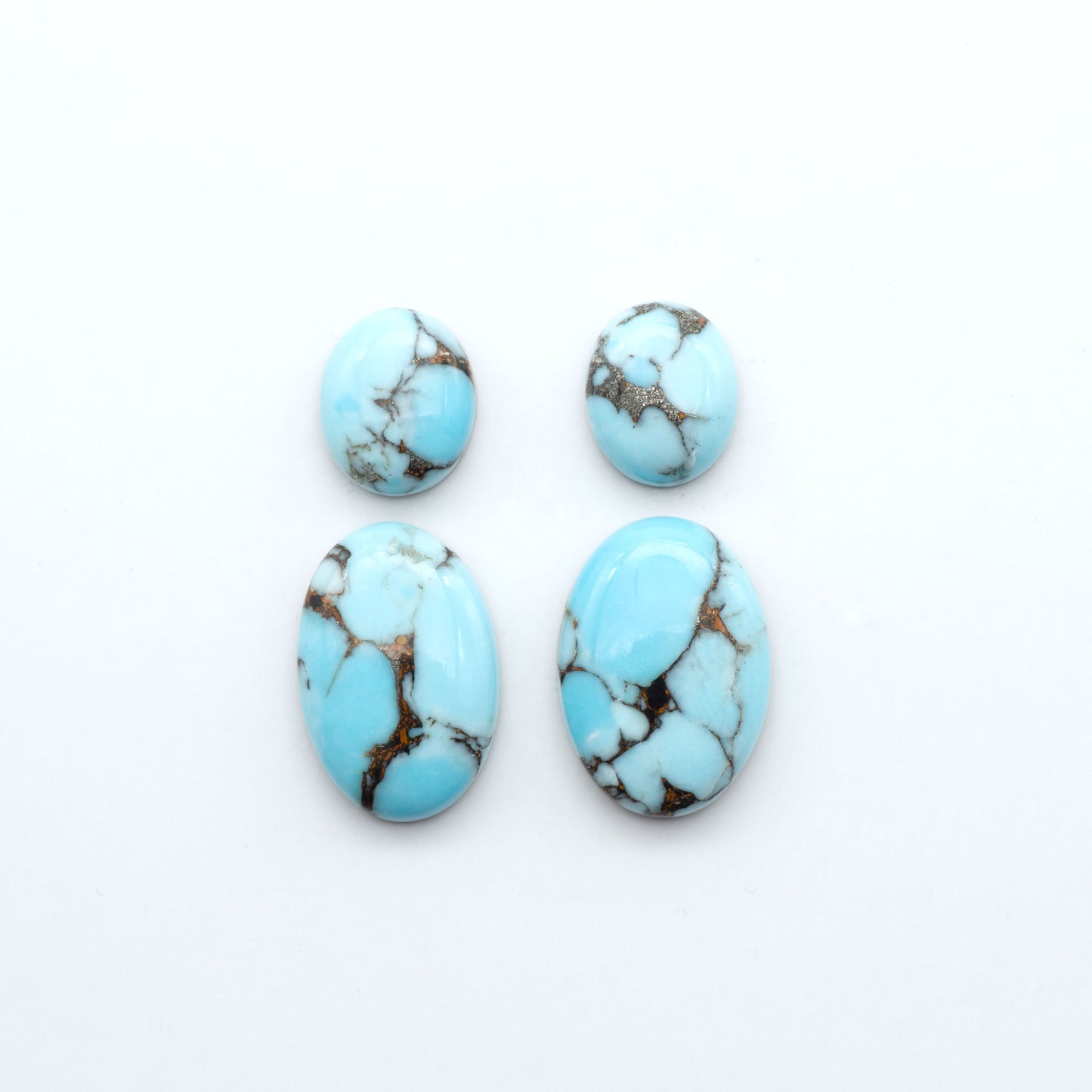 Enhance your jewelry designs with Pressed Turquoise Nugget Cabochons. Crafted from composite materials they add a captivating touch to your creations.