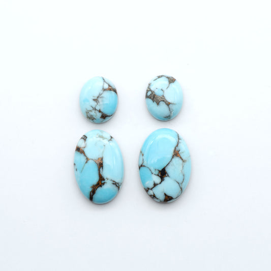 Enhance your jewelry designs with Pressed Turquoise Nugget Cabochons. Crafted from composite materials they add a captivating touch to your creations.